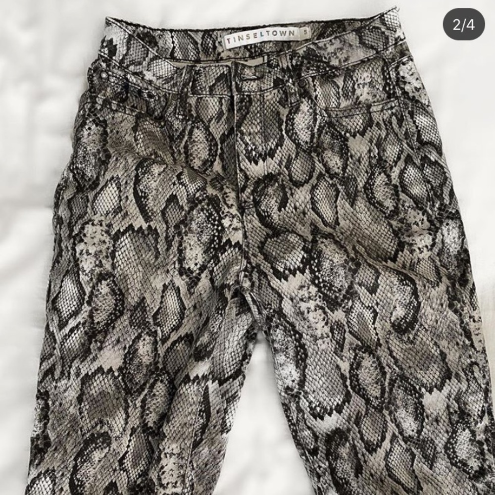 Snakeskin print skinny jeans